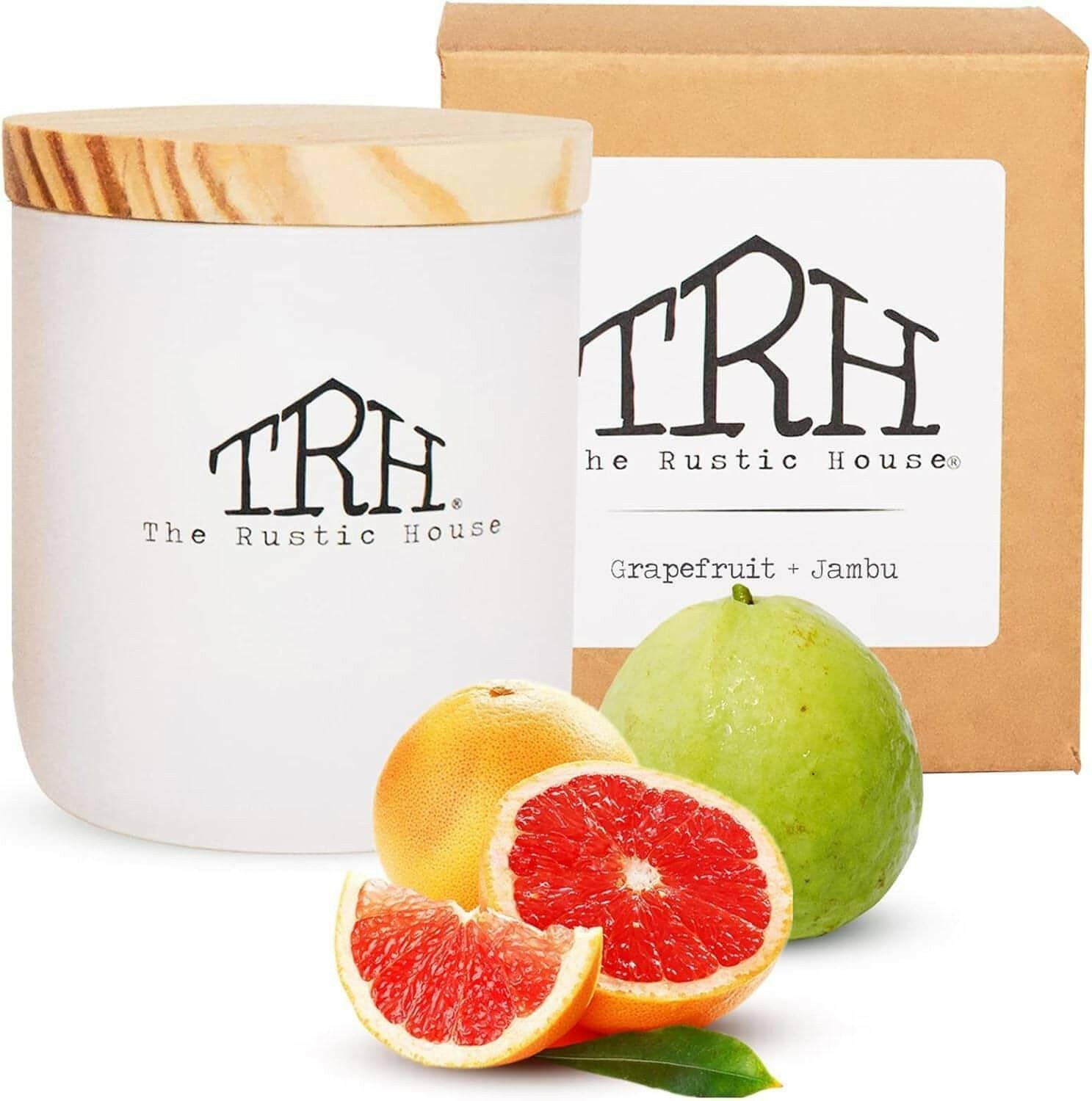 Soy wax scented candle with grapefruit and jambu aroma, hand-poured for home use, featuring long-lasting, non-toxic burn in a chic glass container with wooden lid.